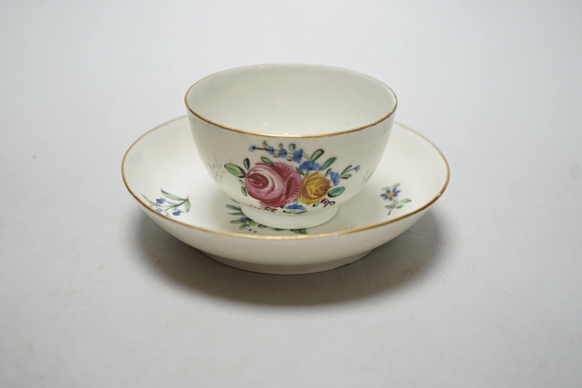Eight 18th century Caughley teabowl and saucer with Back to Back Roses. 6cm overall